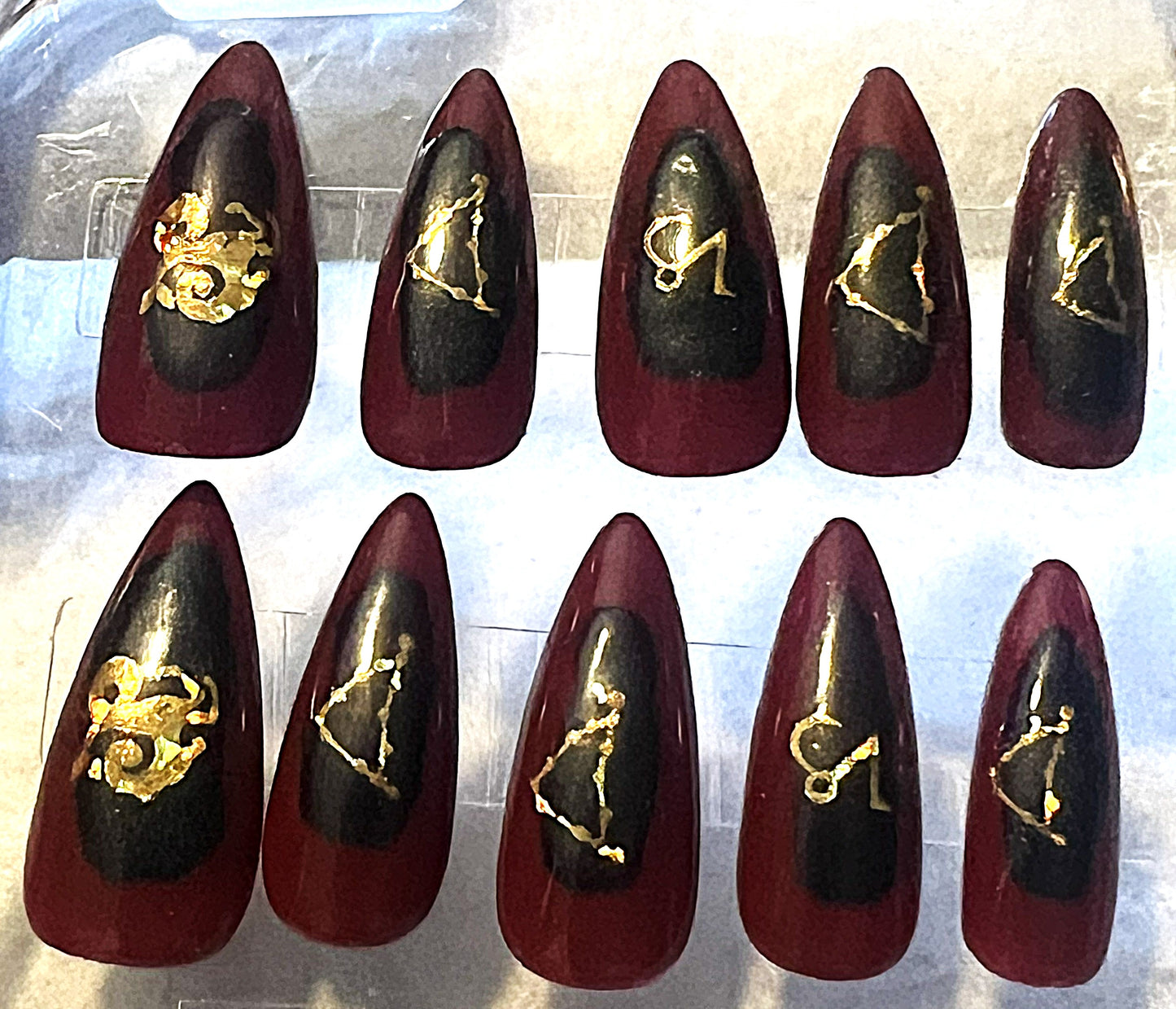 Blooming Capricorn Nails | Red & Black Chrome Aura